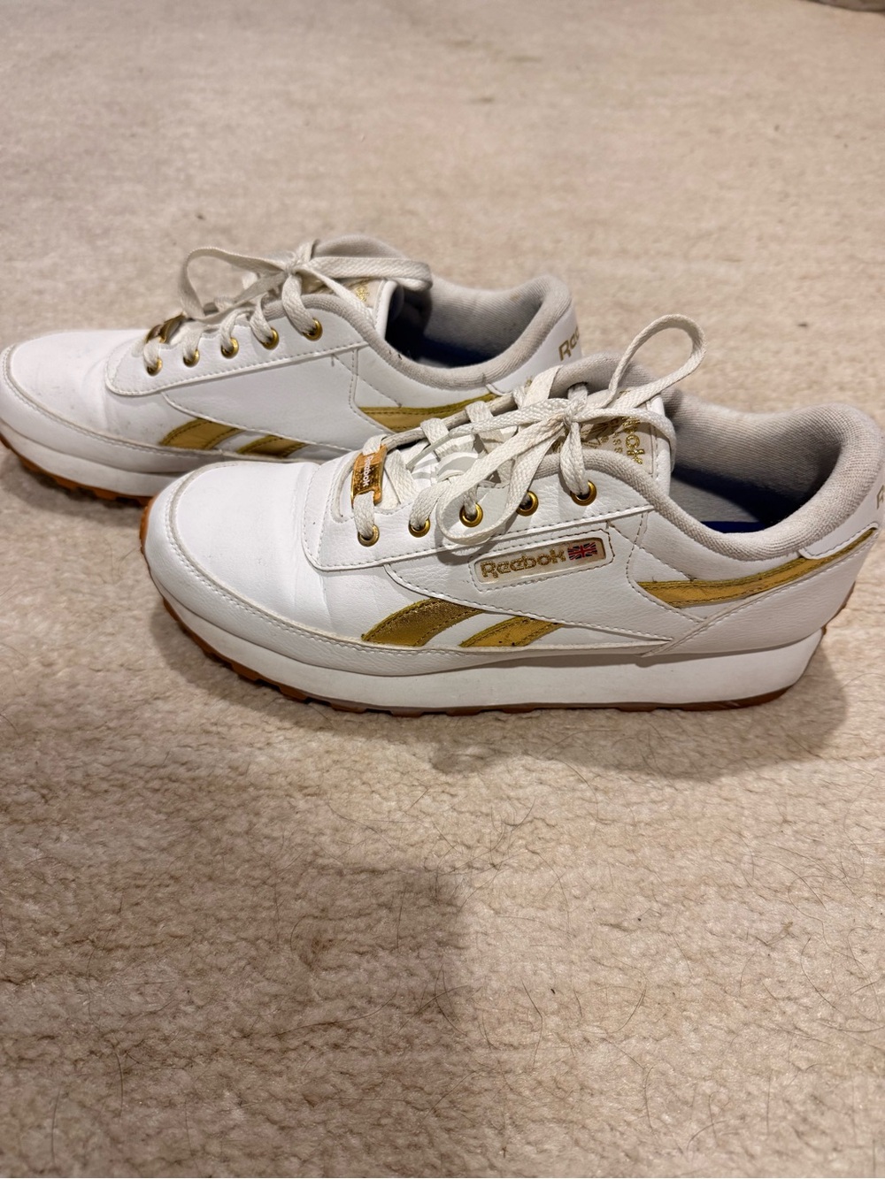 Reebok White Sneakers with Blue Insole and Gold Eyelets